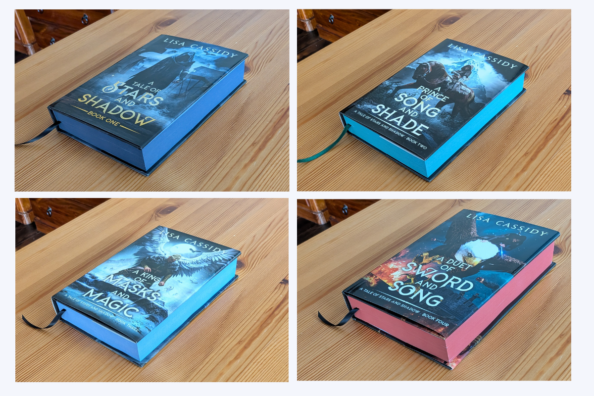 An image o the sprayed edges of all four special editions of A Tale of Stars and Shadow